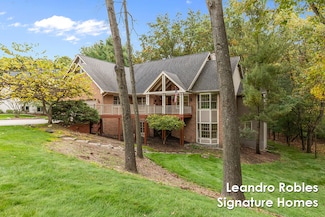 2875 Riverwoods Dr NE, Rockford, MI 49341