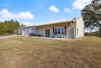 228 River Canyon Rd, MacKs Creek, MO 65786