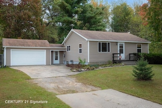 671 S Woodcock Rd, Midland, MI 48640