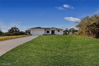 352 Rawlings Ave, Lehigh Acres, FL 33974