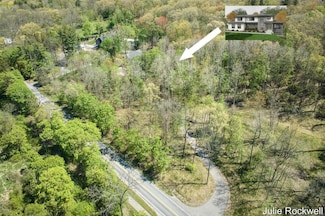 6050 Grand River Dr NE, Ada, MI 49301