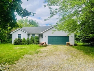 8953 Bricker Rd, Greenwood, MI 48006