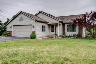 9690 Fairwinds Ct, Alto, MI 49302