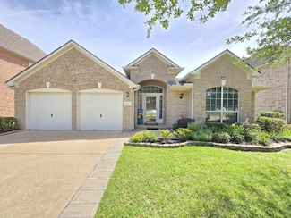 17427 N Riata Lake Dr, Cypress, TX 77433