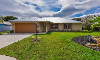 1927 NE San Carlos Calle, Jensen Beach, FL 34957