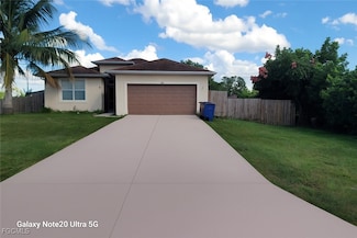 702 Milton Ave N, Lehigh Acres, FL 33971