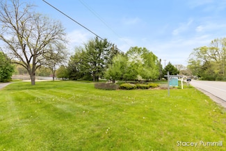 1041 Thornapple River Dr SE, Ada, MI 49301