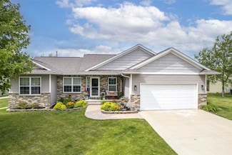 228 Cherry Ln, Tiffin, IA 52340