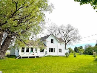 1201 E Duck Lake Rd, Grawn, MI 49637