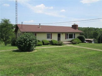 56160 Woodrow Ln, Cumberland, OH 43732