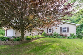 7715 Marquis Dr, Dexter, MI 48130
