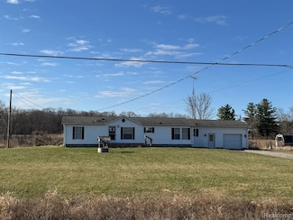 8145 Oatman Rd, Greenwood, MI 48006