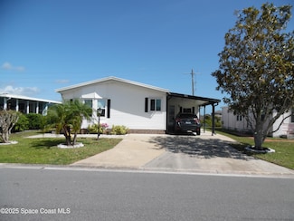 748 Gladiolus Dr, Barefoot Bay, FL 32976