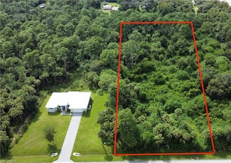 XXX 13th St NW, Rural Estates, FL 34120