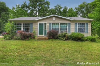 8827 Oak Dr, Sand Lake, MI 49343