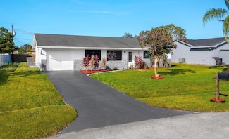 143 SW Grove Ave, Port Saint Lucie, FL 34983
