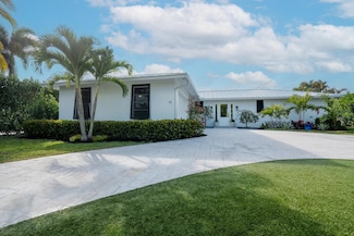 12 SE Hitching Post Cir, Tequesta, FL 33469