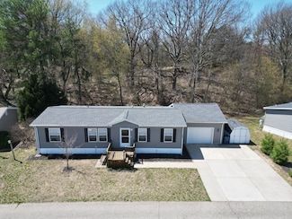8687 Muirfield Dr, West Olive, MI 49460