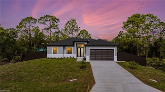 1042 Bassinger Ave S, Lehigh Acres, FL 33974