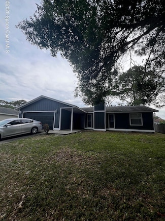 1124 Malone St NW, Palm Bay, FL 32907