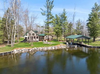 8282 Devils Elbow Dr, Brutus, MI 49716