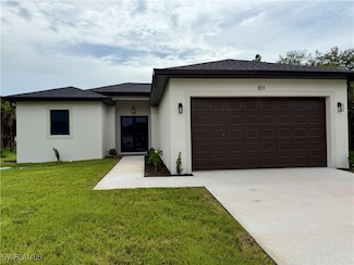 811 Thompson Ave, Lehigh Acres, FL 33972