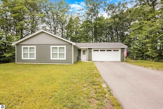 2180 Remington Dr, Kingsley, MI 49649