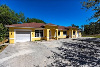 717 Meadow Rd, Lehigh Acres, FL 33973