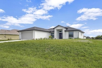 1002 Atherton Ave, Lehigh Acres, FL 33971