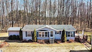 3153 Sand Ln, Grawn, MI 49637