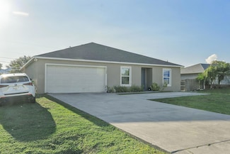 1122 SW Del Rio Blvd, Port Saint Lucie, FL 34953