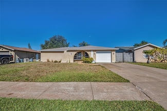 5705 Mariposa Dr, Holiday, FL 34690