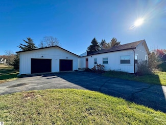 7638 Skegemog Point Rd, Williamsburg, MI 49690