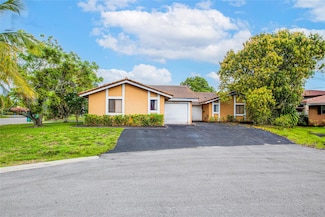 7942 NW 37th Dr, Coral Springs, FL 33065