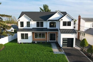 2566 Aster Place N, Westbury, NY 11590