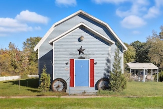 149 S Clark St, Six Lakes, MI 48886