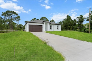 718 Drury Ave, Lehigh Acres, FL 33974