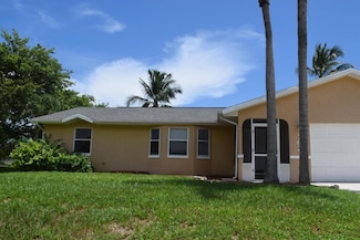 702 SW Arkansas Terrace, Port Saint Lucie, FL 34953