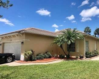 213 SW Deleon Springs Dr, Port Saint Lucie, FL 34986
