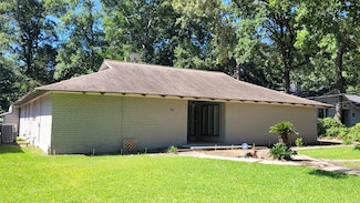 24 Greentree Ln, Conroe, TX 77304