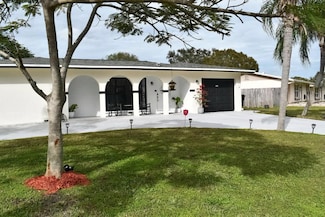 234 NE Surrey St, Port Saint Lucie, FL 34983