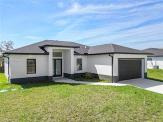 853 Frederick Reid St E, Lehigh Acres, FL 33974