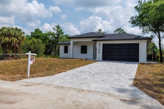 402 Thompson Ave, Lehigh Acres, FL 33972
