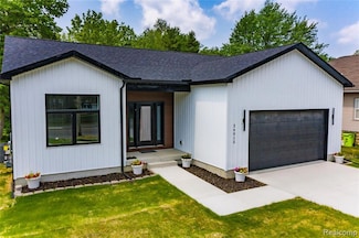 26015 E Huron River Dr, Flat Rock, MI 48134