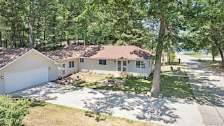 121 14th St, Prudenville, MI 48651