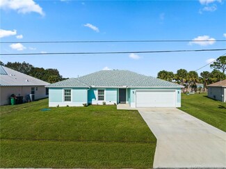 1033 SW Ingrassina Ave, Port St. Lucie, FL 34953