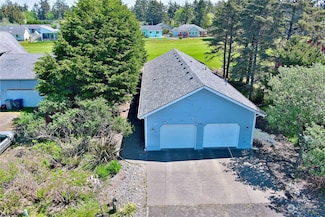 566 Canal Dr NE, Ocean Shores, WA 98569