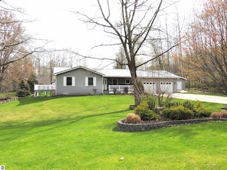 1026 Granada Dr, Weidman, MI 48893
