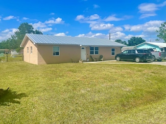 7677 NW 90th Ct, Okeechobee, FL 34972