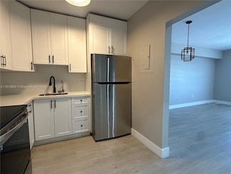 5731 NW 37th St Unit 500F, Virginia Gardens, FL 33166